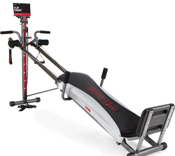 The Total Gym 1400 includes several attachments for working different muscle groups.